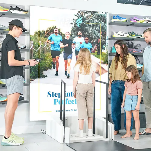 Family getting outfitted at Fleet Feet store